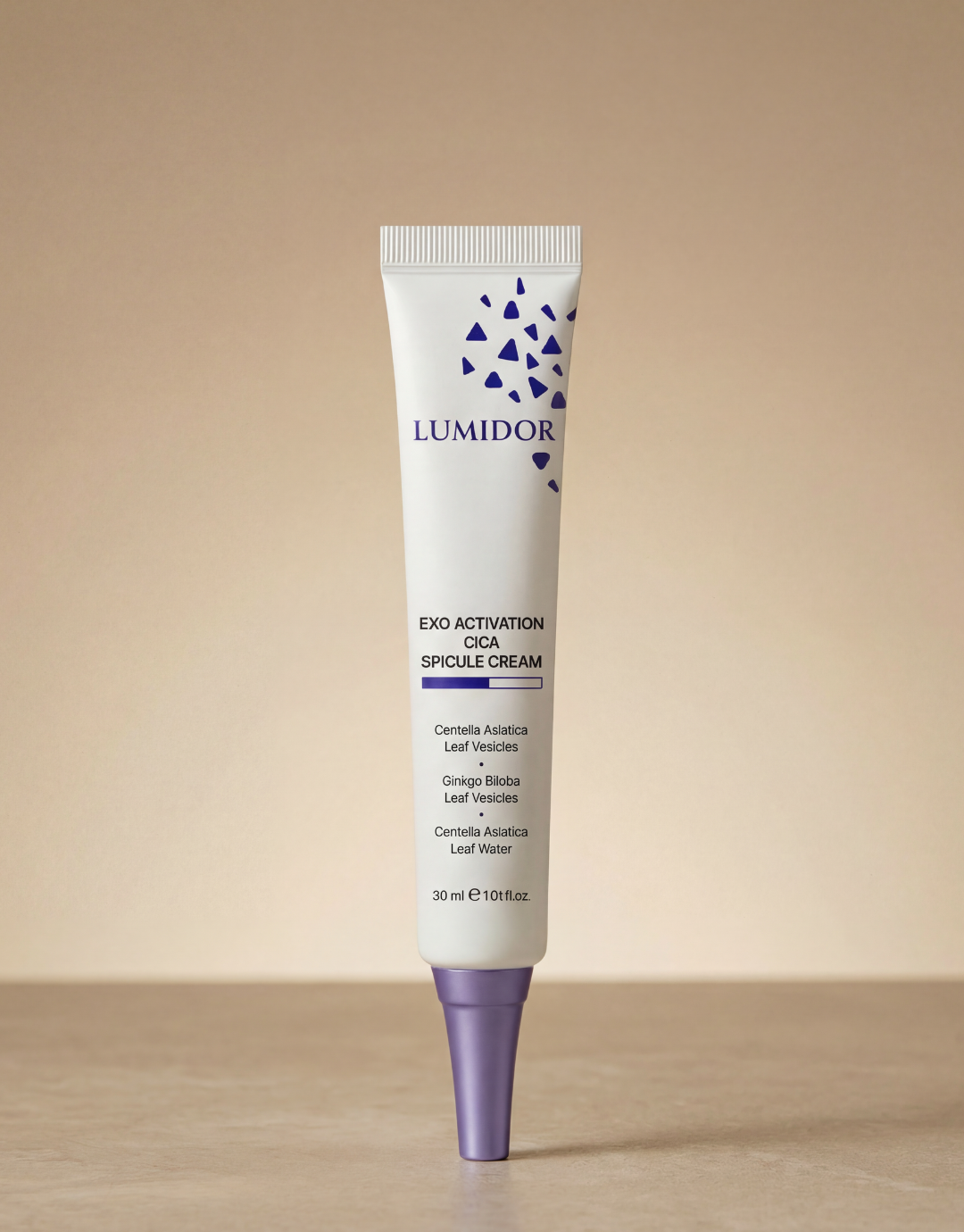 Lumidor Exo Activation Cica Spicule Cream tube on a beige background